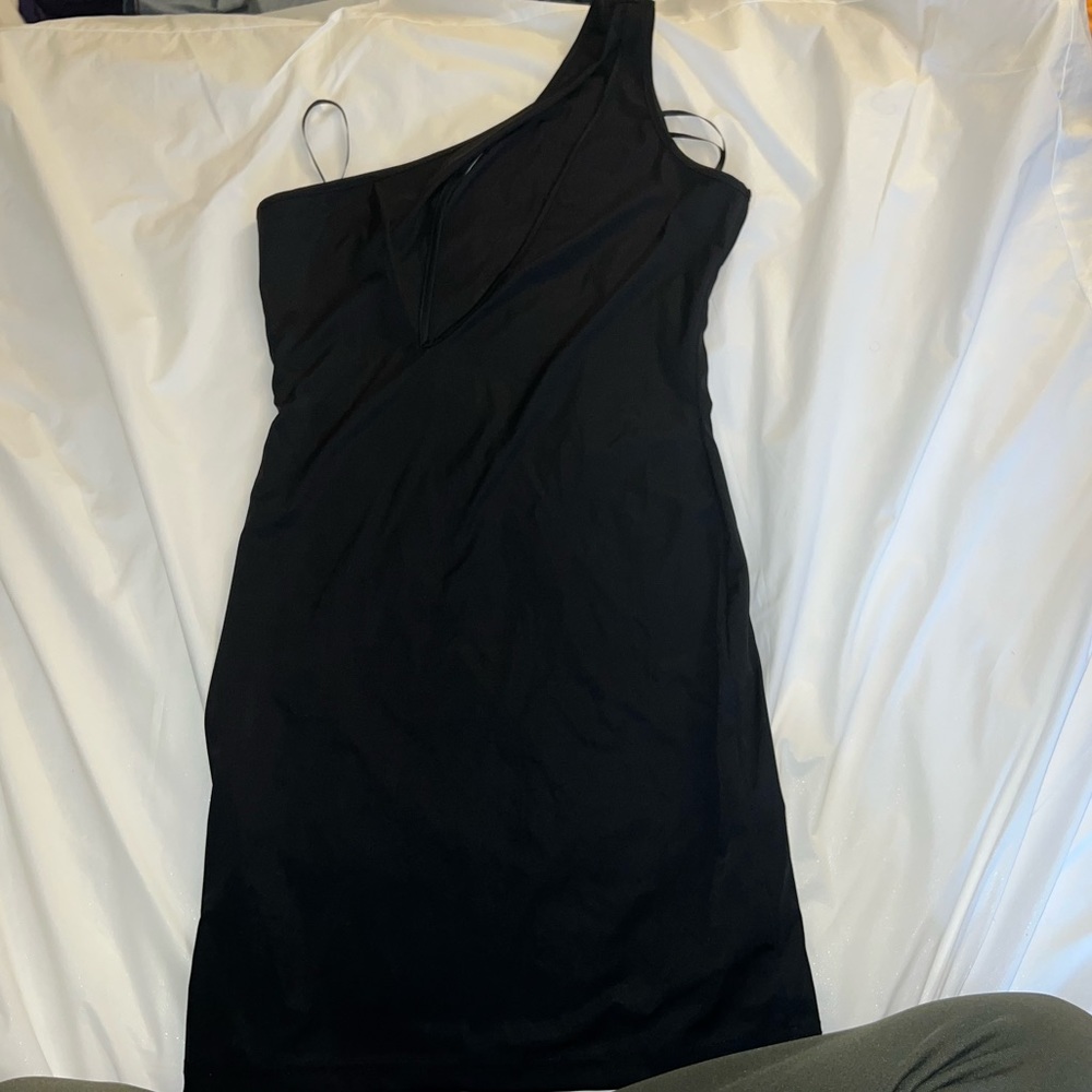 NEW black dress with slit on chest.